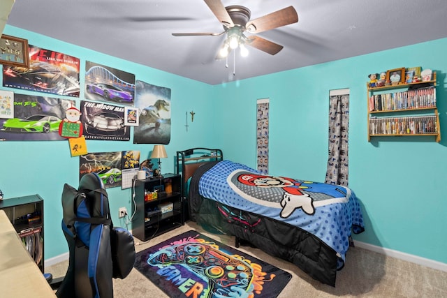 bedroom featuring a ceiling fan, baseboards, and carpet floors