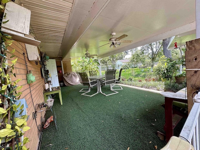 view of patio / terrace featuring ceiling fan