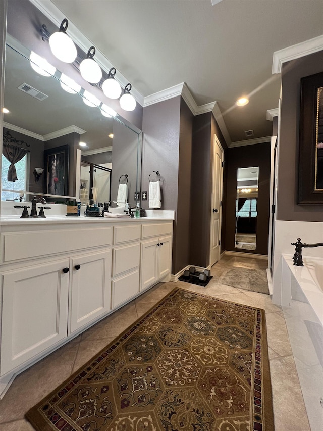 5770 Scenic Dr, Beaumont, TX 77713 - full bathroom with ornamental molding, double vanity, tile patterned floors, a bath, and recessed lighting