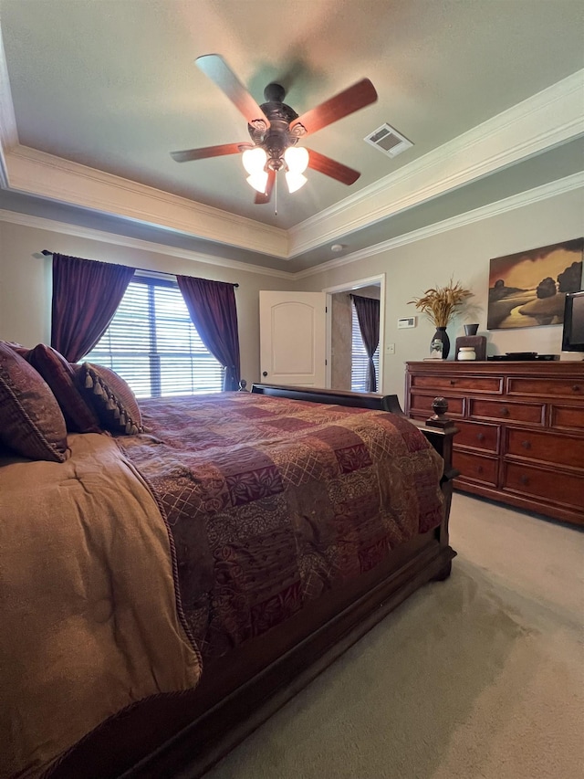 5770 Scenic Dr, Beaumont, TX 77713 - bedroom featuring a raised ceiling, ornamental molding, light colored carpet, and ceiling fan