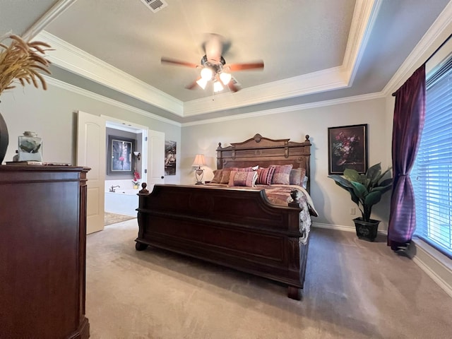 5770 Scenic Dr, Beaumont, TX 77713 - bedroom with light colored carpet, a tray ceiling, ornamental molding, and a ceiling fan