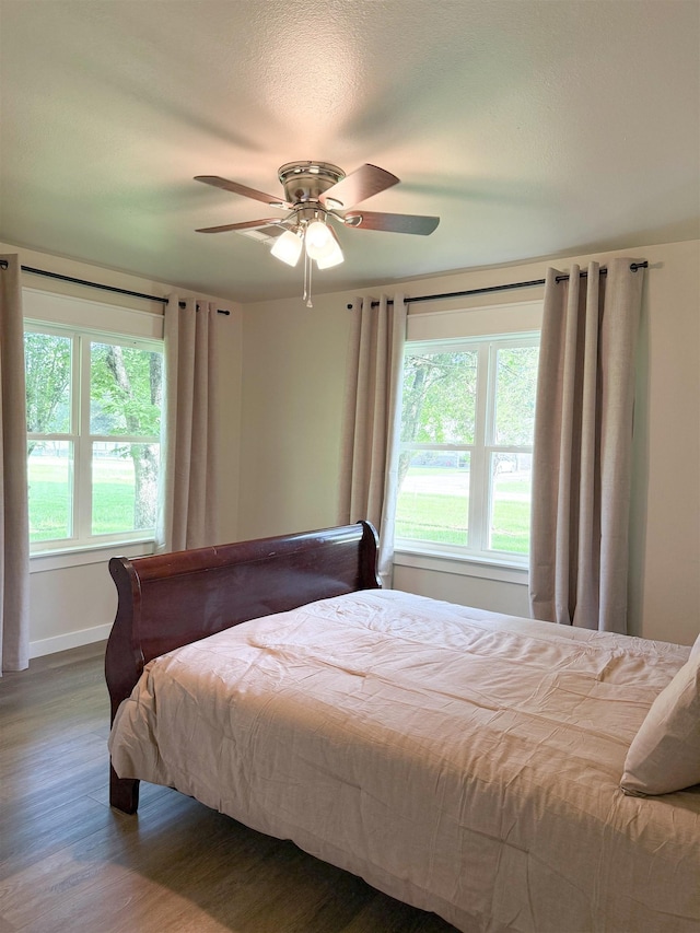 6744 Keith Rd, Lumberton, TX 77657 - bedroom with wood finished floors and ceiling fan