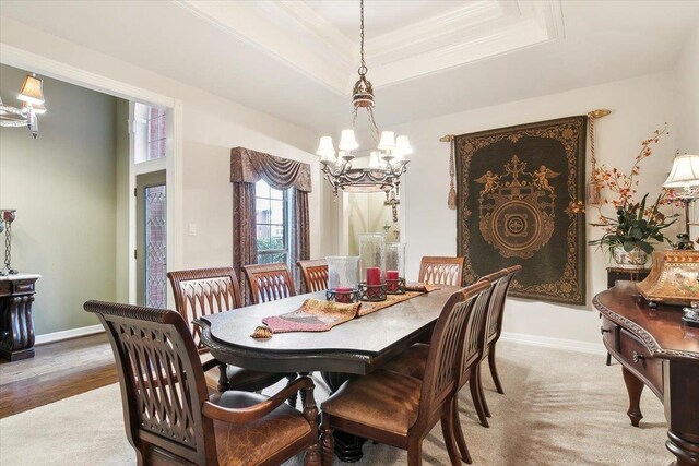 6401 Steeple Chasse Dr, Orange, TX 77632 - carpeted dining room with an inviting chandelier, crown molding, and a raised ceiling