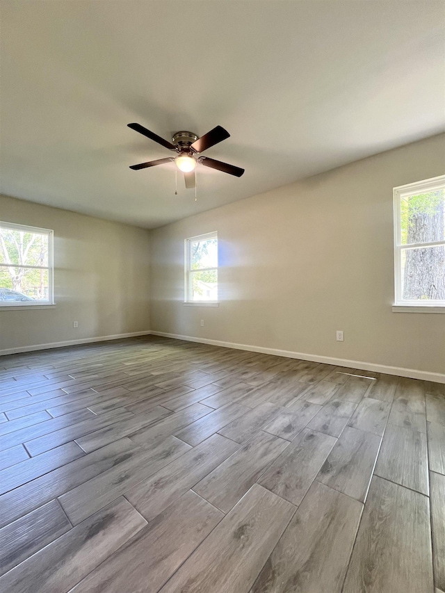 spare room featuring ceiling fan