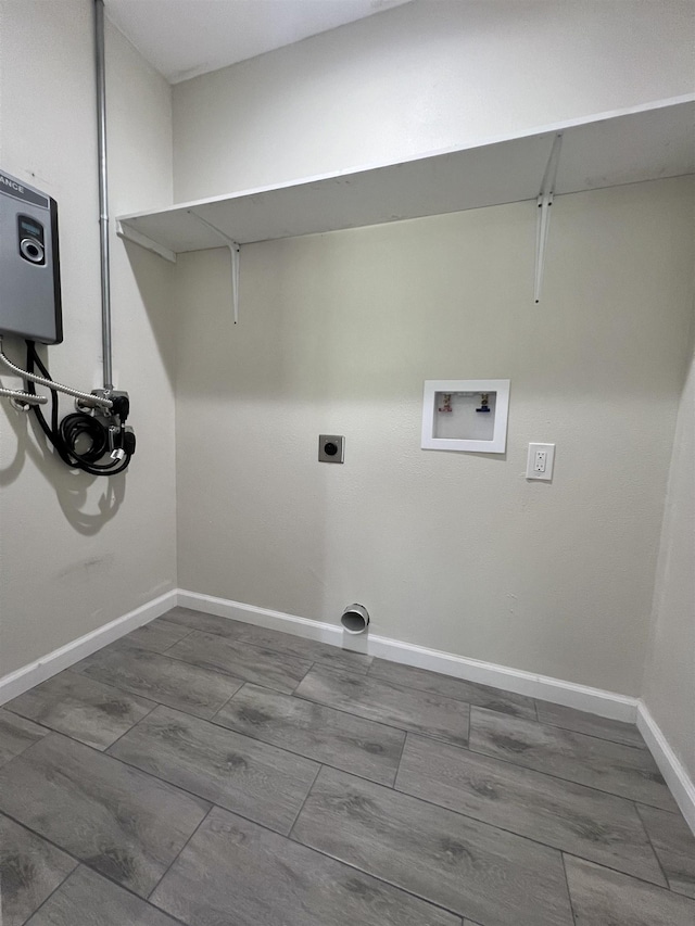 clothes washing area featuring hookup for an electric dryer and washer hookup