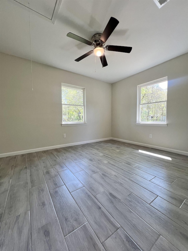 unfurnished room featuring ceiling fan