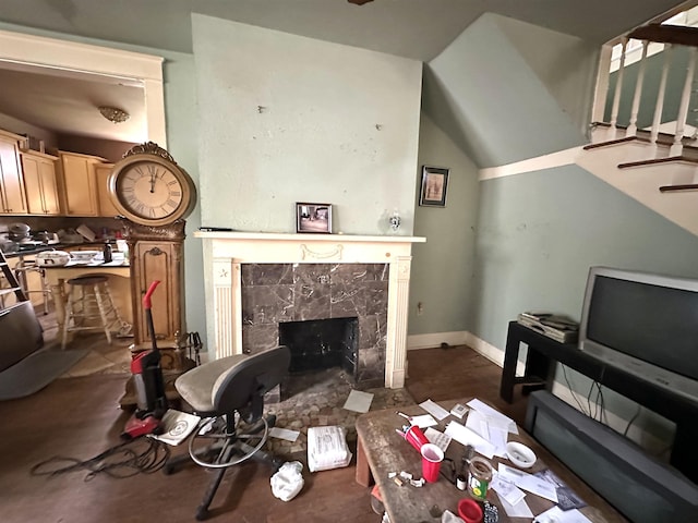 living room featuring a premium fireplace