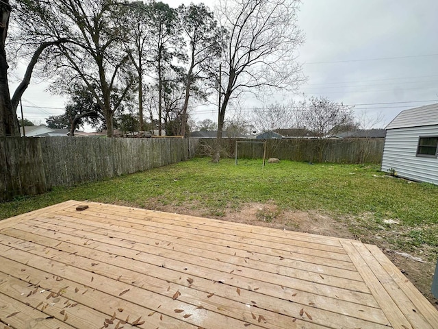 deck featuring a lawn