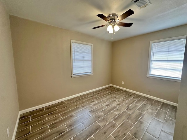 unfurnished room featuring ceiling fan