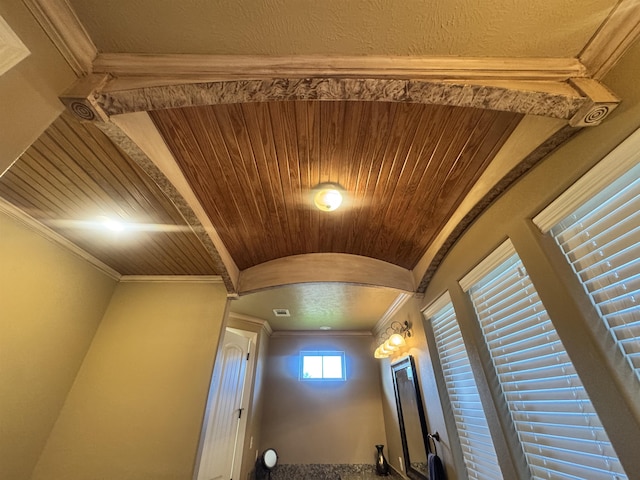 156 Remington Cir, Lumberton, TX 77657 - detailed view of arched walkways, wooden ceiling, and crown molding