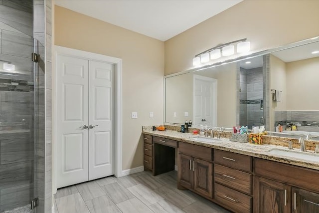 bathroom featuring vanity and separate shower and tub