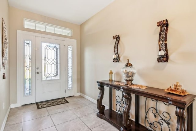 foyer with light tile patterned floors