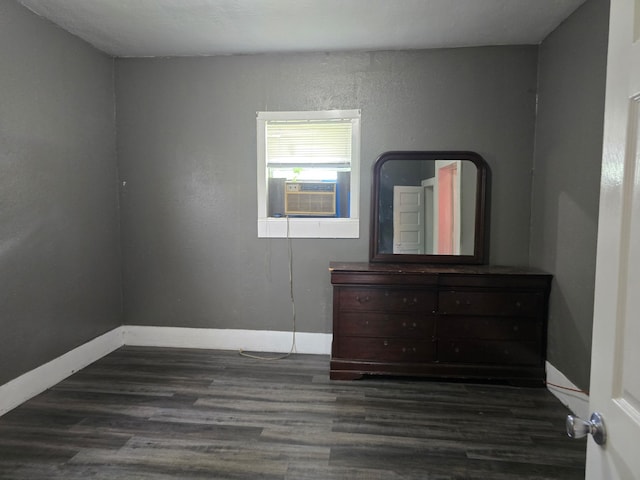 936 9th St, Port Arthur, TX 77640 - unfurnished bedroom featuring cooling unit and wood finished floors