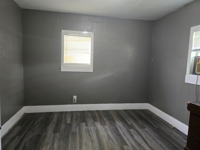 936 9th St, Port Arthur, TX 77640 - spare room featuring baseboards and wood finished floors