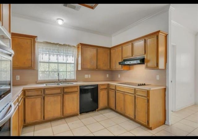 kitchen featuring brown cabinets, under cabinet range hood, light countertops, black appliances, and a sink