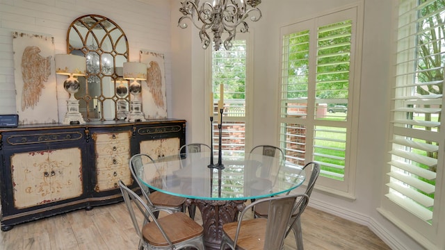 5065 Turner Rd, Orange, TX 77630 - dining space featuring a chandelier and light wood-style flooring