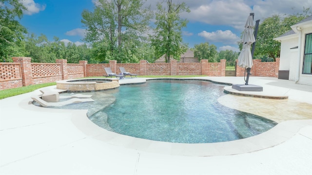 5065 Turner Rd, Orange, TX 77630 - view of swimming pool featuring a patio area and a pool with connected hot tub