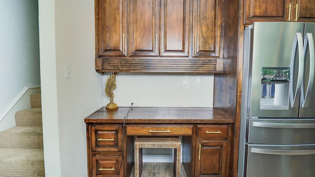 5065 Turner Rd, Orange, TX 77630 - kitchen with stainless steel fridge and dark countertops