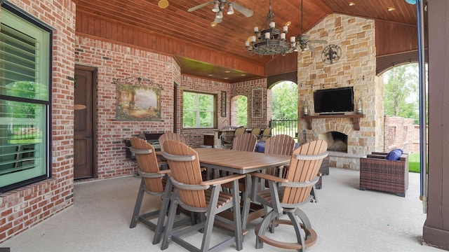 5065 Turner Rd, Orange, TX 77630 - view of patio / terrace with an outdoor stone fireplace and ceiling fan