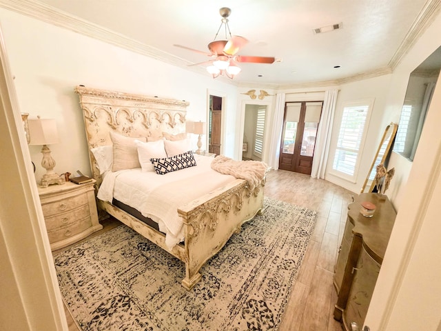 5065 Turner Rd, Orange, TX 77630 - bedroom with light wood finished floors, crown molding, and a ceiling fan
