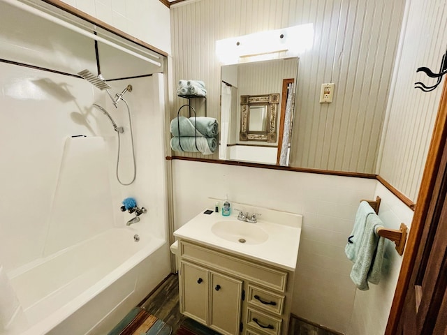 bathroom with vanity and tub / shower combination