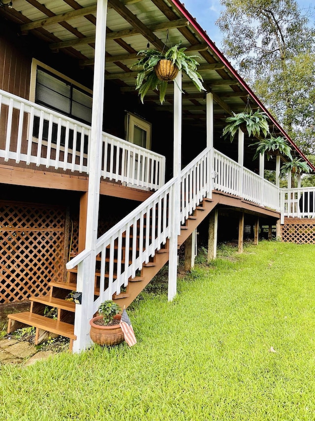 view of side of home featuring a lawn