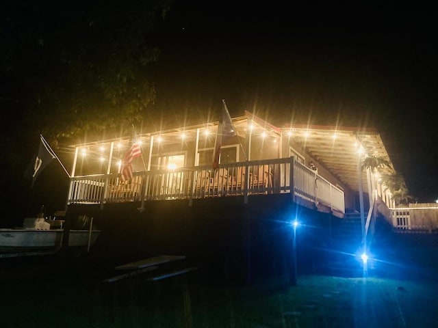 view of back house at night