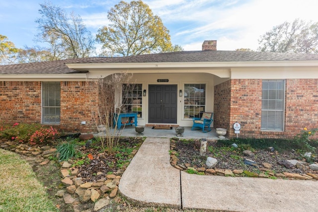 entrance to property with a porch