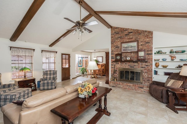 living room featuring ceiling fan, a fireplace, and vaulted ceiling with beams