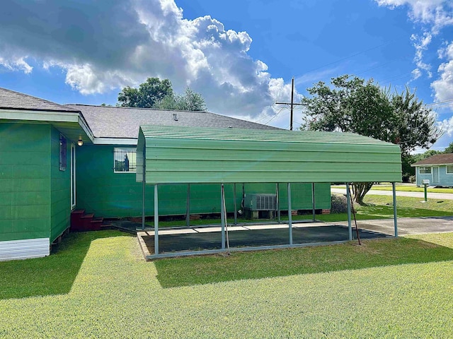 2349 Amino St, Port Arthur, TX 77640 - view of community with a yard, a detached carport, and entry steps