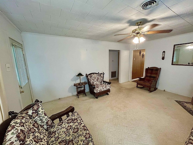 2349 Amino St, Port Arthur, TX 77640 - living area featuring ceiling fan and light colored carpet