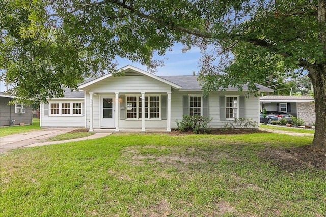 ranch-style home with a front lawn