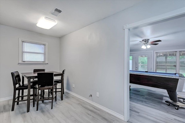 2125 10th St, Port Neches, TX 77651 - dining room with wood finished floors, plenty of natural light, and baseboards