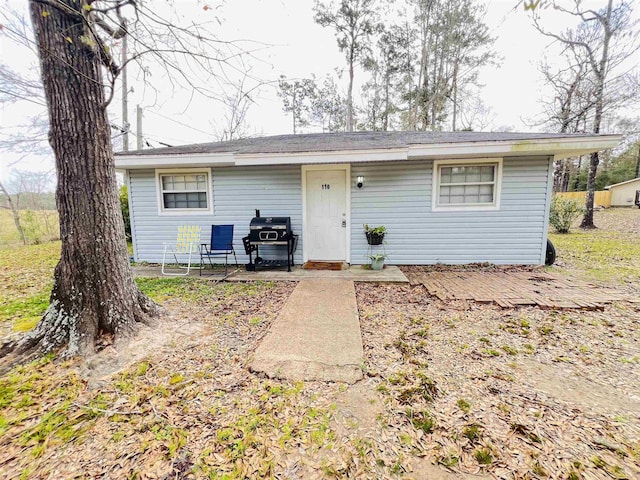 110 Tamarisk St, Village Mills, TX 77663 - ranch-style house with a patio