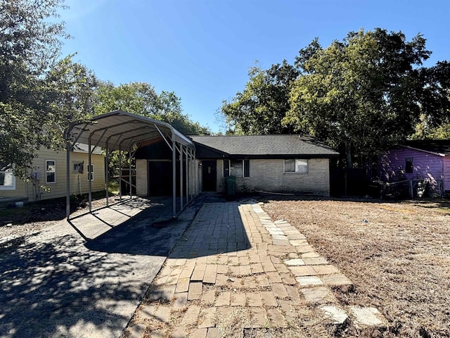 view of front of house with a carport