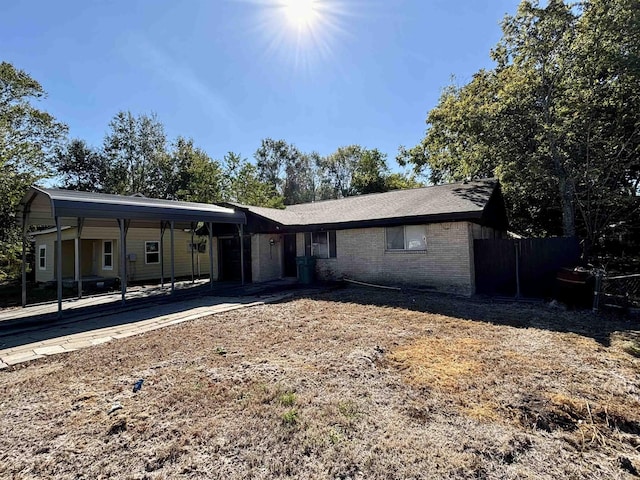 view of front of home featuring a carport