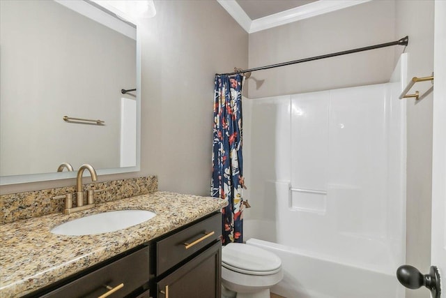 bathroom featuring toilet, vanity, and ornamental molding