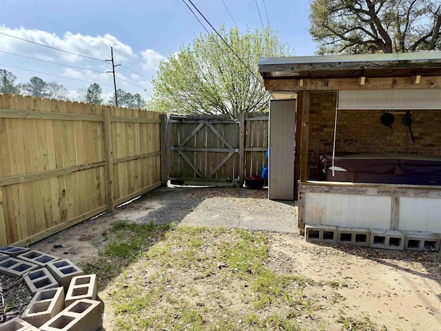 view of yard with a gate and fence