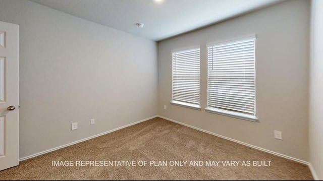 1690 Haidlyns Way, Sour Lake, TX 77659 - empty room featuring carpet floors and baseboards