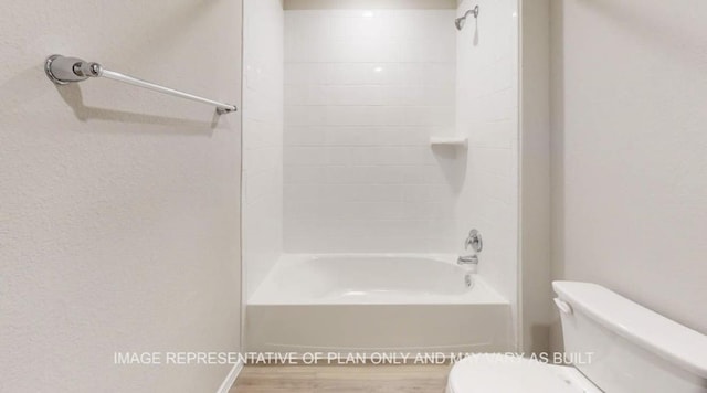 1690 Haidlyns Way, Sour Lake, TX 77659 - full bath featuring toilet, shower / bathtub combination, and wood finished floors