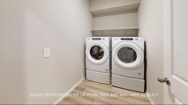 1690 Haidlyns Way, Sour Lake, TX 77659 - washroom featuring washer and clothes dryer, wood finished floors, and baseboards