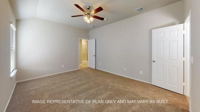 1690 Haidlyns Way, Sour Lake, TX 77659 - unfurnished bedroom with carpet floors, baseboards, and vaulted ceiling