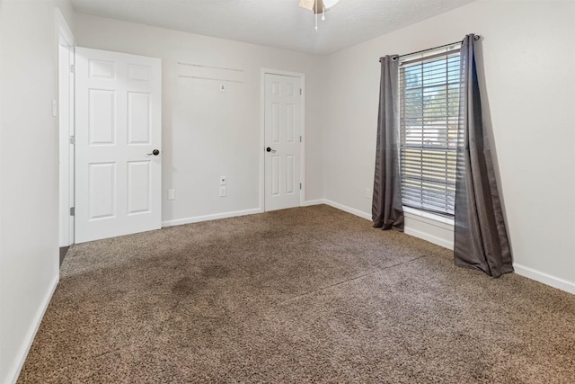 unfurnished room featuring carpet floors