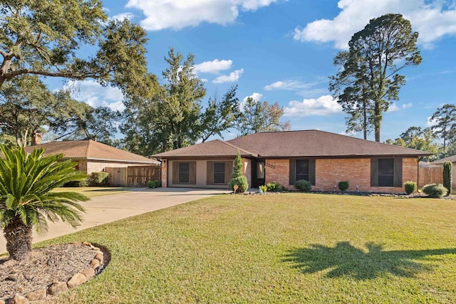 ranch-style house with a front yard