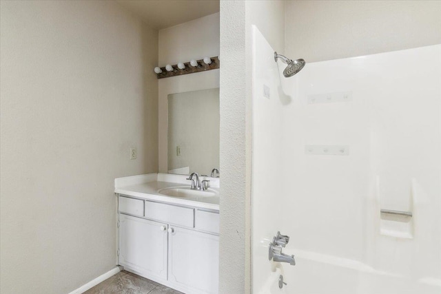 bathroom featuring vanity and bathing tub / shower combination