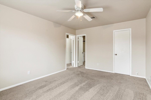 unfurnished bedroom featuring ceiling fan and carpet flooring