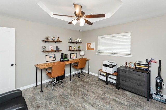 office area with ceiling fan and wood-type flooring