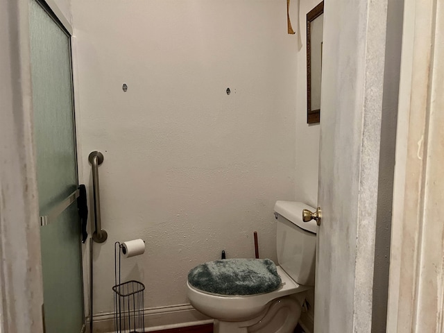 bathroom featuring toilet