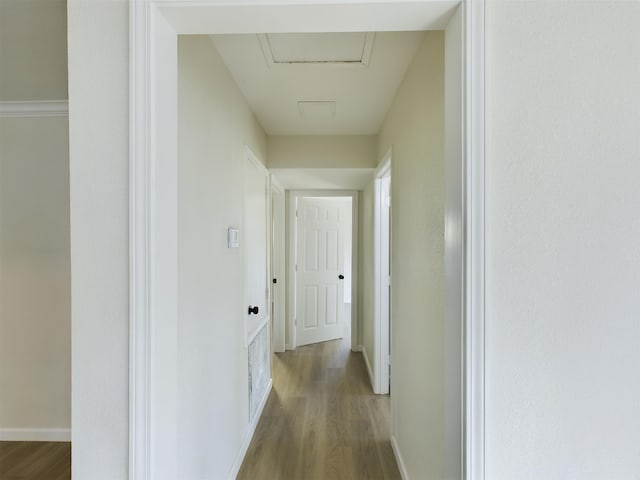 5260 Landry Ln, Beaumont, TX 77708 - hall featuring attic access, wood finished floors, and baseboards