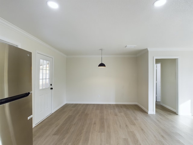 5260 Landry Ln, Beaumont, TX 77708 - entrance foyer featuring baseboards, ornamental molding, light wood-style floors, and recessed lighting